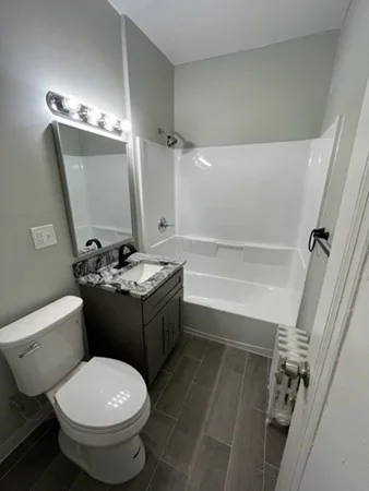 4 bed, 1 bath apartment for rent at 590 Walk Hill St Unit 1, Mattapan — photo 8 of 11