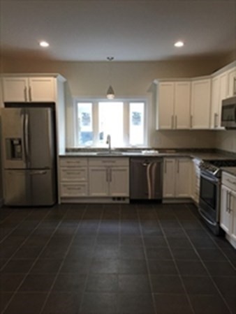4 bed, 2 bath apartment for rent at 6 Henry St Unit 1, Medford — photo 2 of 10