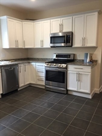 4 bed, 2 bath apartment for rent at 6 Henry St Unit 1, Medford — photo 4 of 10