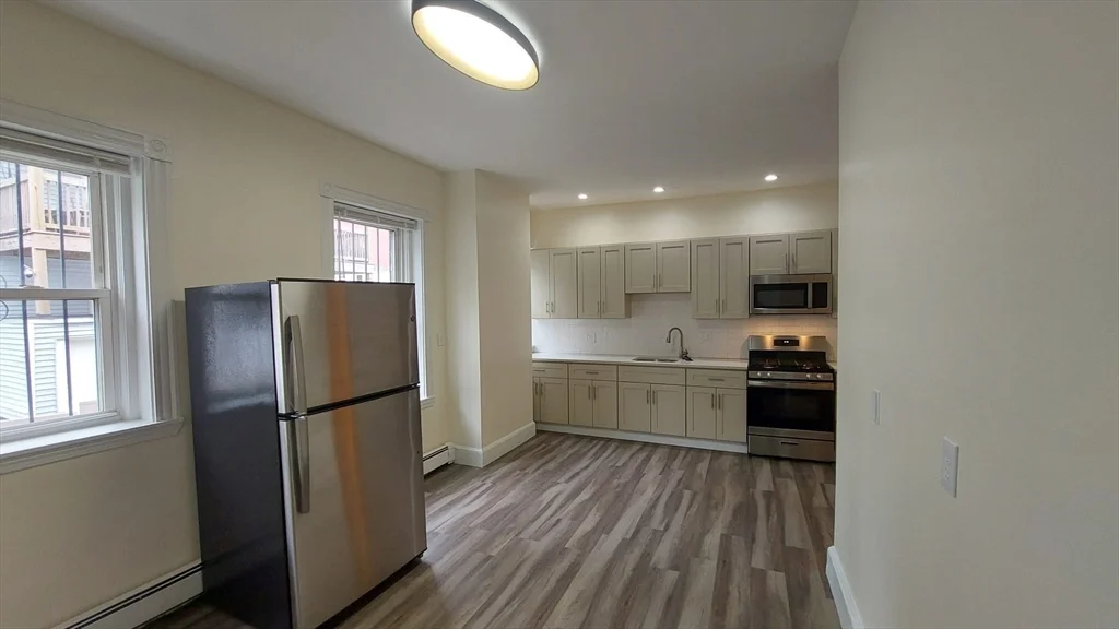 4 bed, 1 bath apartment for rent at 6 Wabeno St Unit 1, Roxbury — photo 4 of 12