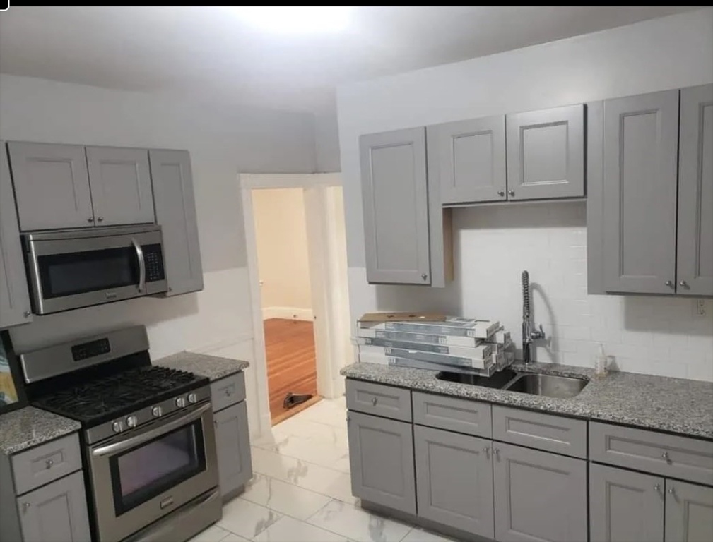 3 bed, 1 bath apartment for rent at 60 Bellevue St Unit 2, Boston — photo 2 of 9