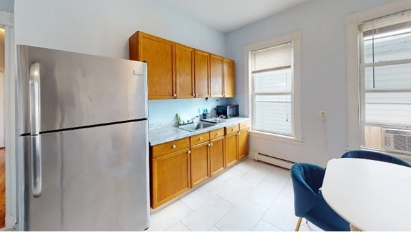 4 bed, 1 bath apartment for rent at 61 Crescent Ave Unit 3, Boston — photo 3 of 14