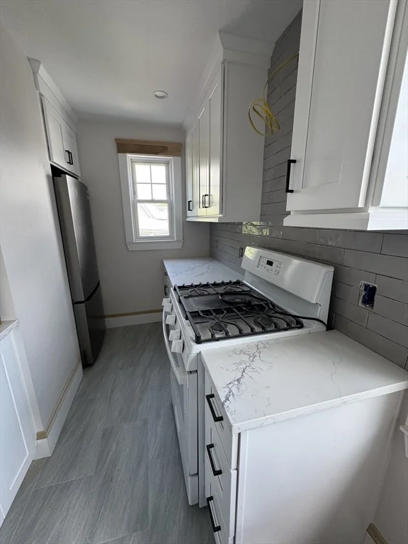 4 bed, 1 bath apartment for rent at 61 Templeton Pkwy Unit 61, Watertown — photo 4 of 34