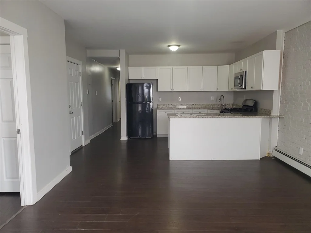 4 bed, 1 bath apartment for rent at 620 Dudley St Unit 4, Dorchester — photo 2 of 14