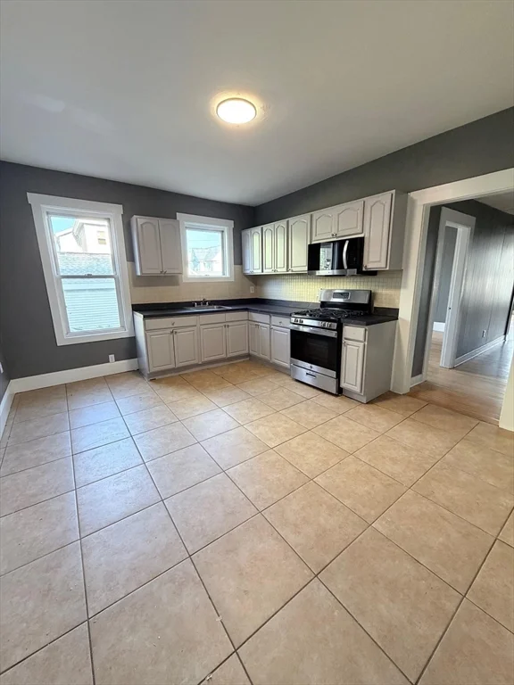 4 bed, 1 bath apartment for rent at 63 Harvard St Unit 1, Brockton — photo 1 of 13