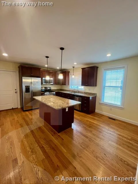 3 bed, 2 bath apartment for rent at 64 Bow St Unit 1, Magoun Square — photo 2 of 24