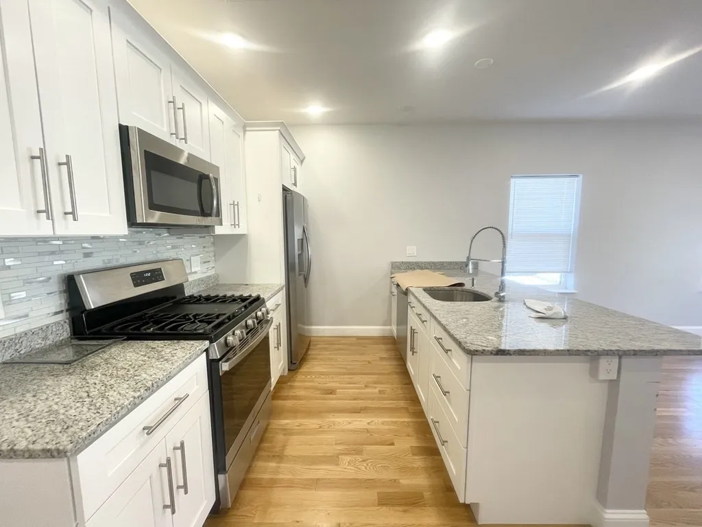 3 bed, 2 bath apartment for rent at 65 Burrell St Unit 2, Boston — photo 1 of 15