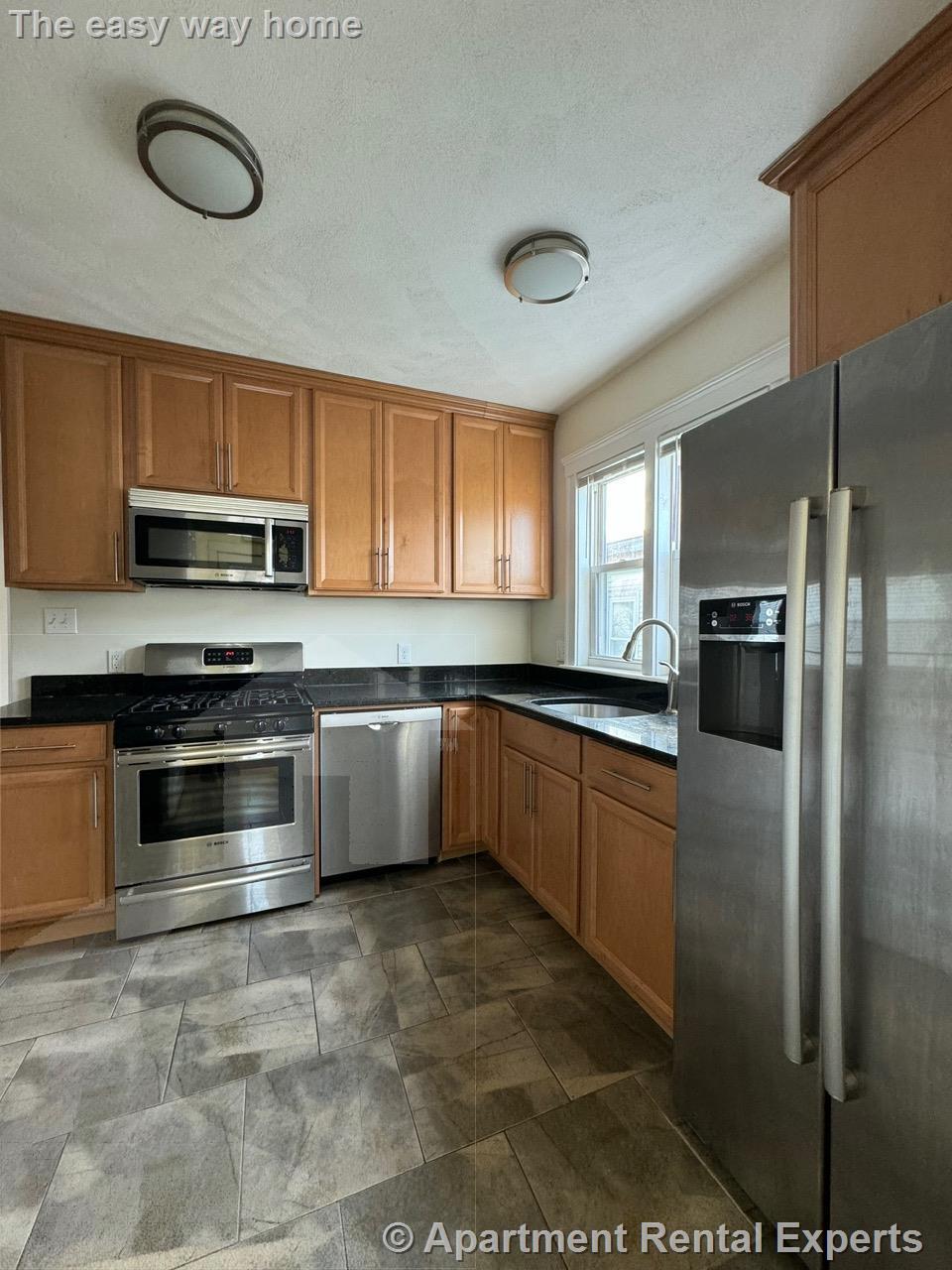 3 bed, 2 bath apartment for rent at 65 Conwell Ave Unit 3, Teele Square — photo 2 of 18
