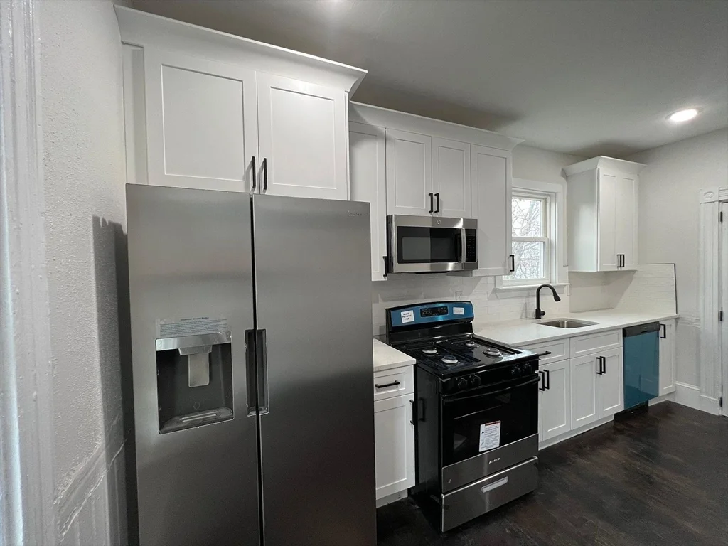 4 bed, 2 bath apartment for rent at 65 Lambert St Unit 3, Boston — photo 2 of 19