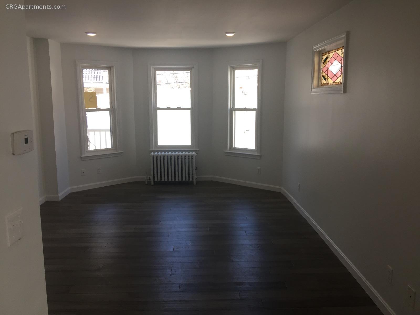 3 bed, 2 bath apartment for rent at 65 Lowell St Unit 1T, Spring Hill — photo 5 of 15
