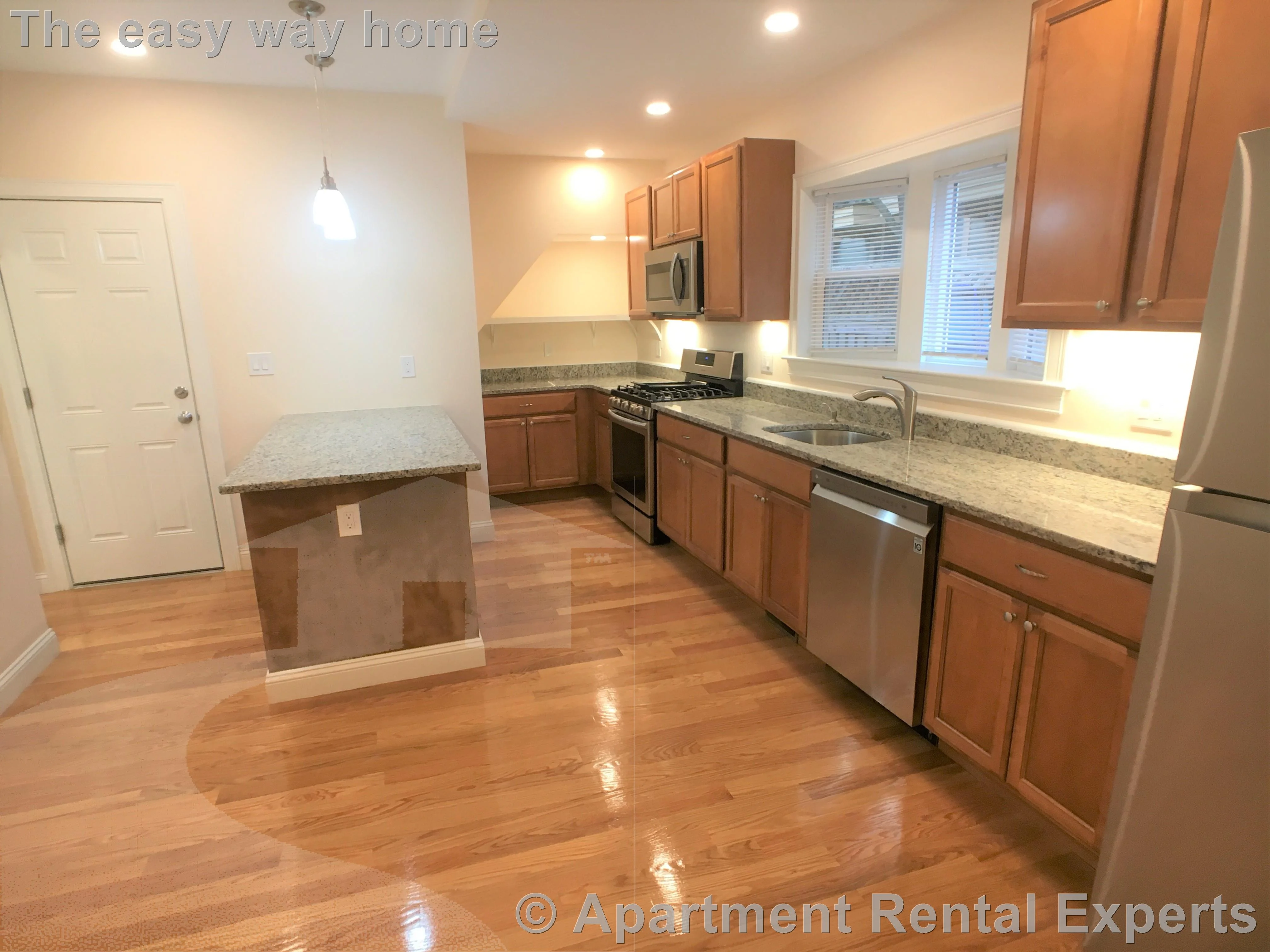 4 bed, 3 bath apartment for rent at 67 Temple St Unit 1, Winter Hill — photo 1 of 18