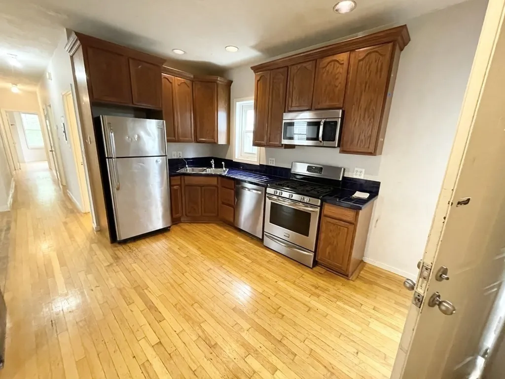 4 bed, 1 bath apartment for rent at 7 Iroquois St Unit 2, Mission Hill — photo 2 of 15