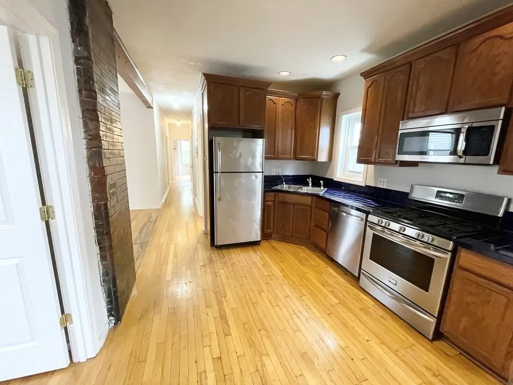 4 bed, 1 bath apartment for rent at 7 Iroquois St Unit 2, Mission Hill — photo 1 of 15