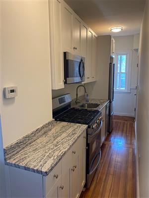 2 bed, 1 bath apartment for rent at 7 Pearson Ave Unit 2, Powder House Square — photo 1 of 14