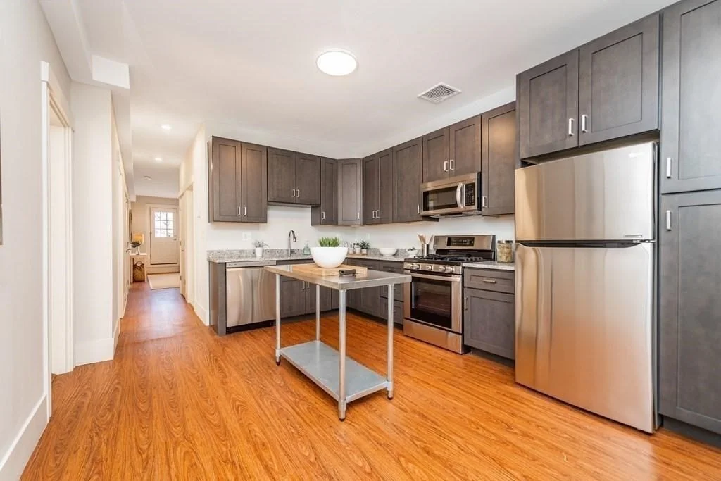 4 bed, 2 bath apartment for rent at 71 Adams St Unit 3, Magoun Square — photo 2 of 13