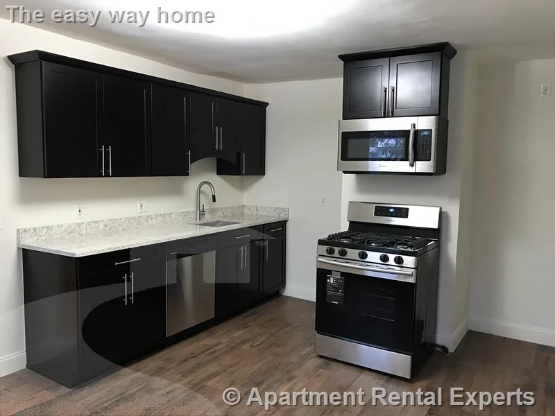 1 bed, 1 bath apartment for rent at 72 School St Unit 1, Central Square — photo 1 of 15