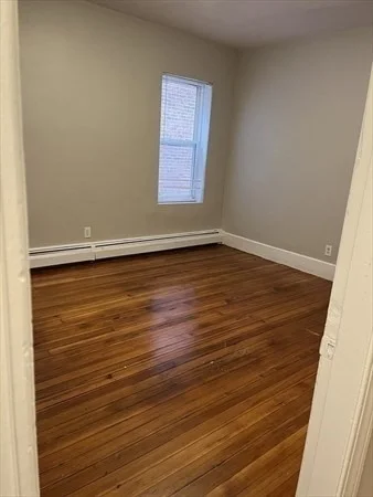 5 bed, 1 bath apartment for rent at 73 Charles St Unit 1, Dorchester — photo 2 of 7
