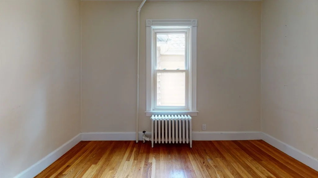 3 bed, 1 bath apartment for rent at 74 Saint Rose Unit 2, Jamaica Plain — photo 5 of 9