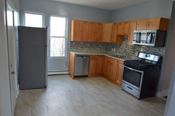 4 bed, 1 bath apartment for rent at 77 Holworthy St Unit 3, Roxbury — photo 2 of 4