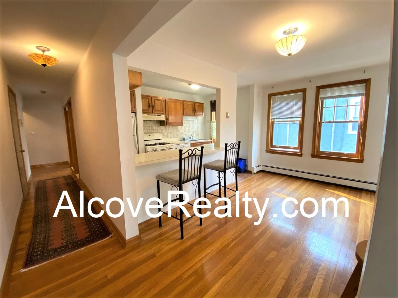 1 bed, 1 bath apartment for rent at 77 Liberty Ave Unit 10, Powder House Square — photo 2 of 14