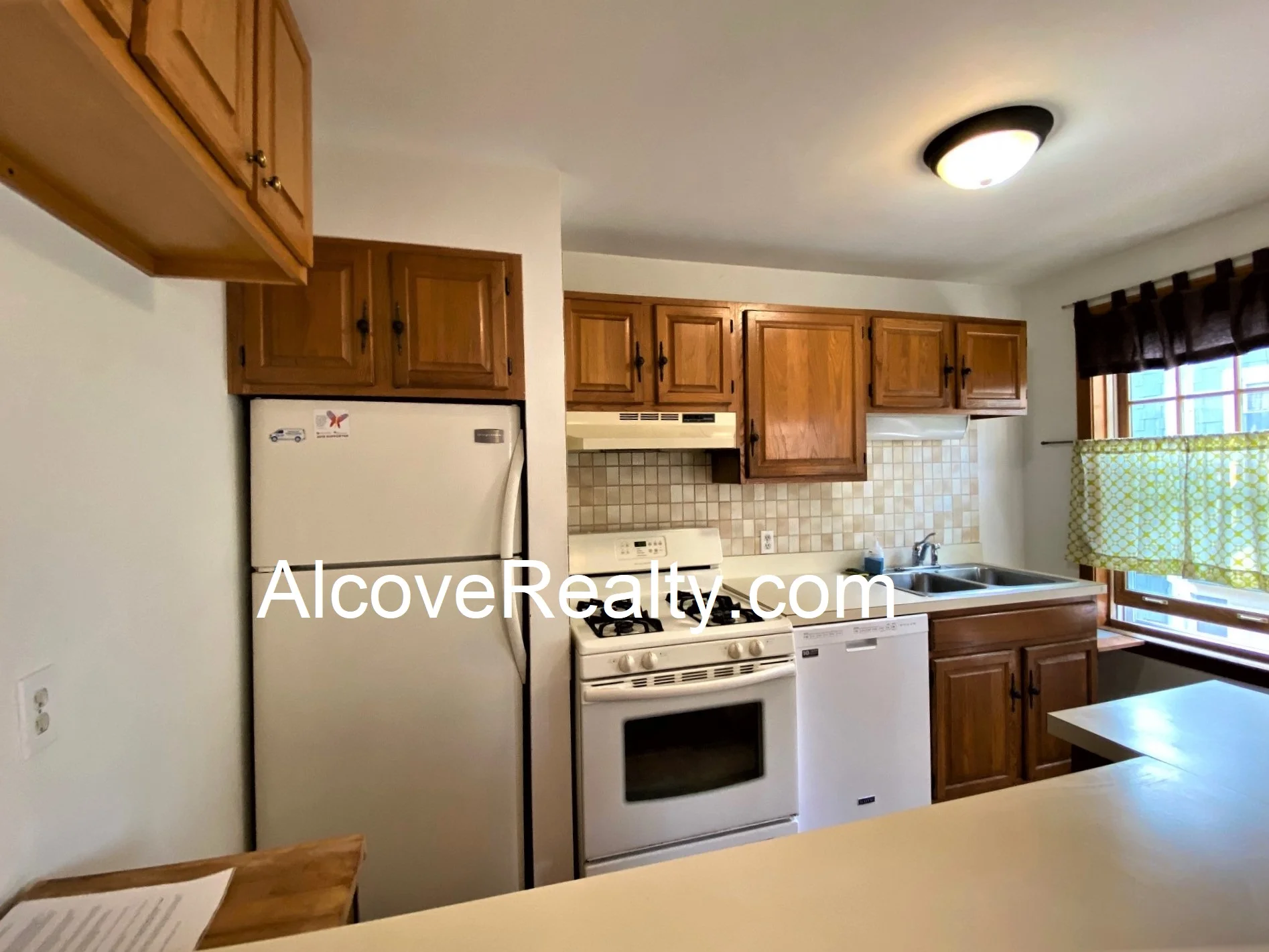1 bed, 1 bath apartment for rent at 77 Liberty Ave Unit 10, Powder House Square — photo 3 of 14