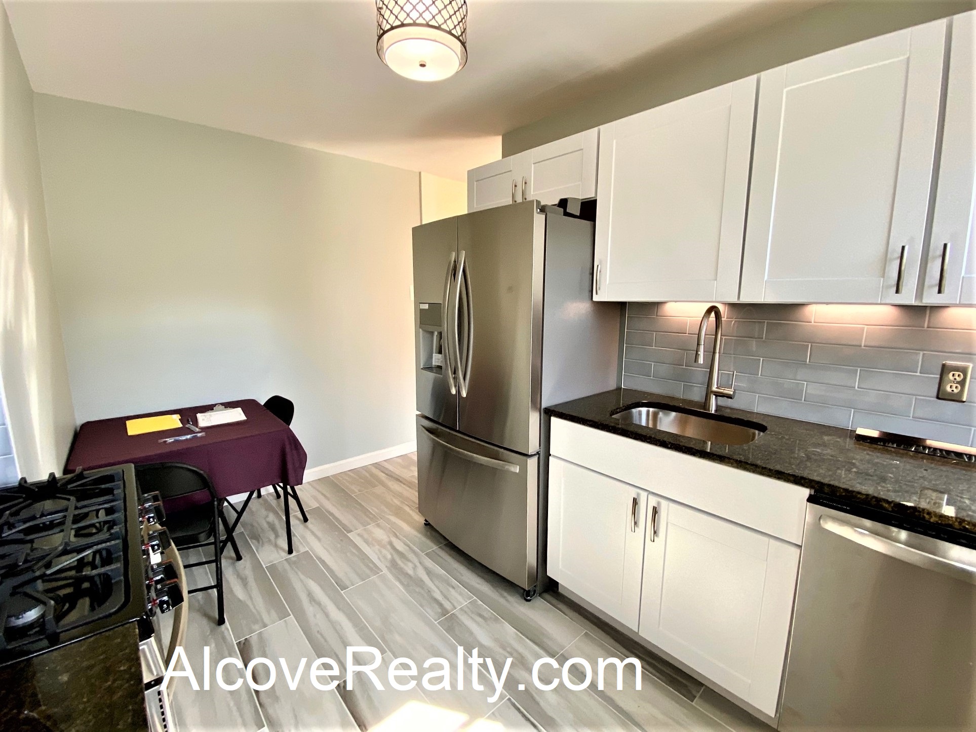 1 bed, 1 bath apartment for rent at 77 Liberty Ave Unit 14, Powder House Square — photo 2 of 6