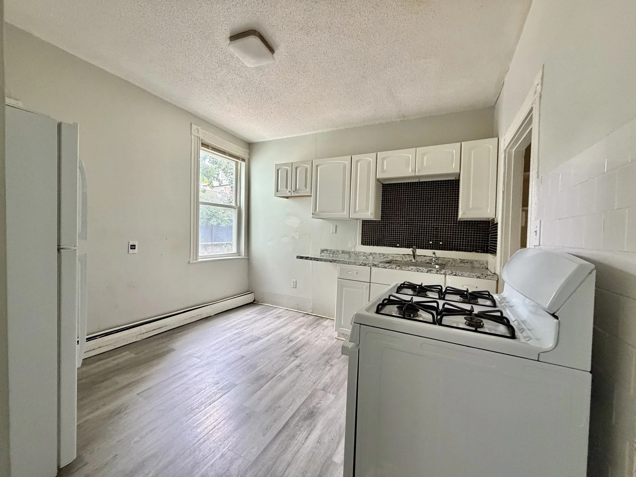 3 bed, 1 bath apartment for rent at 8-10 Oakland St Unit 1, Roxbury — photo 11 of 14