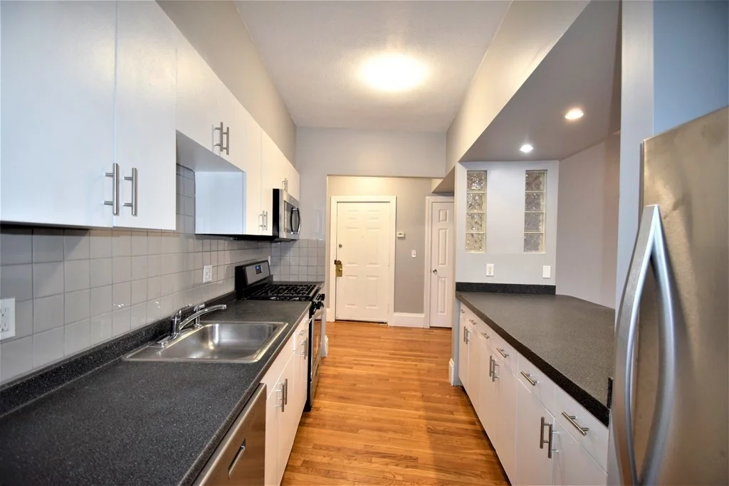 4 bed, 2 bath apartment for rent at 83 Glenville Ave Unit 2, Allston — photo 2 of 12