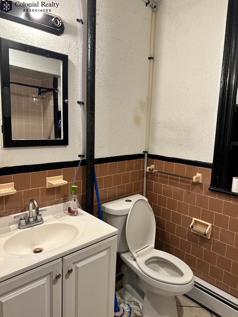 3 bed, 1 bath apartment for rent at 9 Linden St Unit 7, Allston — photo 4 of 8