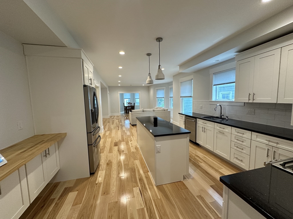4 bed, 3 bath apartment for rent at 90 Bartlett St Unit 1, Winter Hill — photo 8 of 23