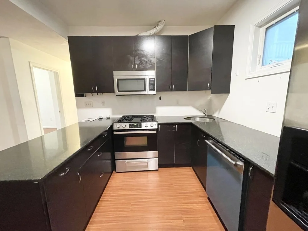 4 bed, 1 bath apartment for rent at 93A Hillside St Unit 2, Mission Hill — photo 1 of 16