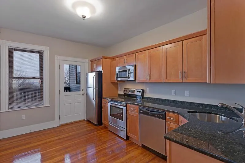 5 bed, 2 bath apartment for rent at 94 Gladstone St Unit 1, East Boston — photo 10 of 12