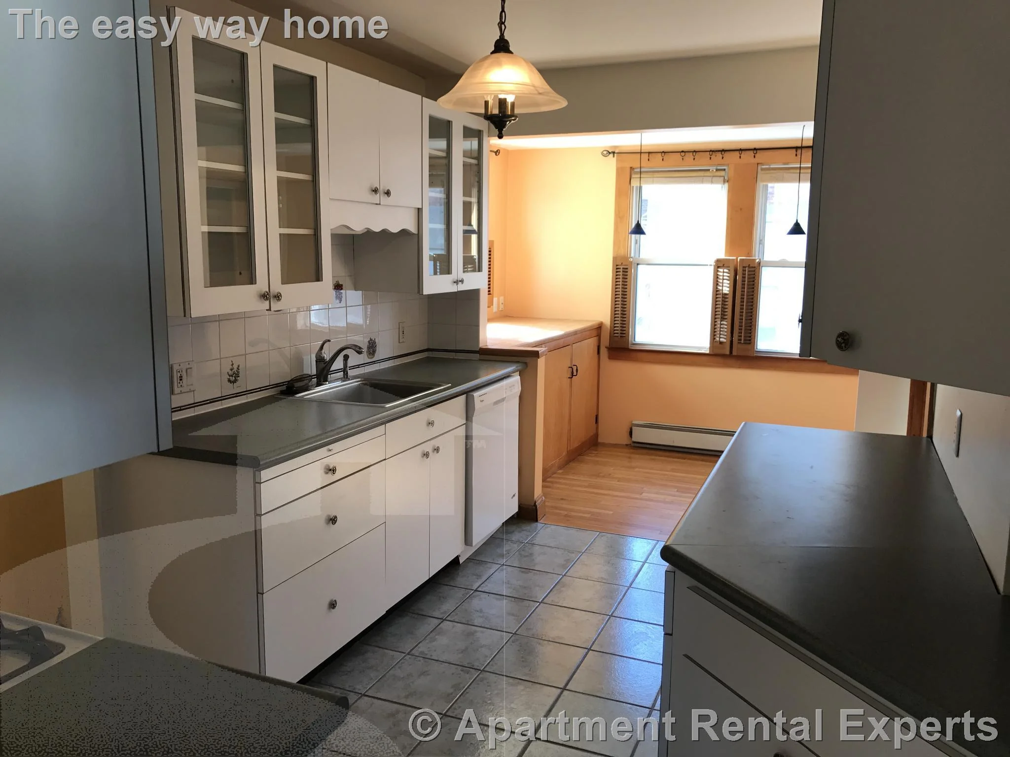 4 bed, 2 bath apartment for rent at 94 Heath St Unit 1, Winter Hill — photo 1 of 9